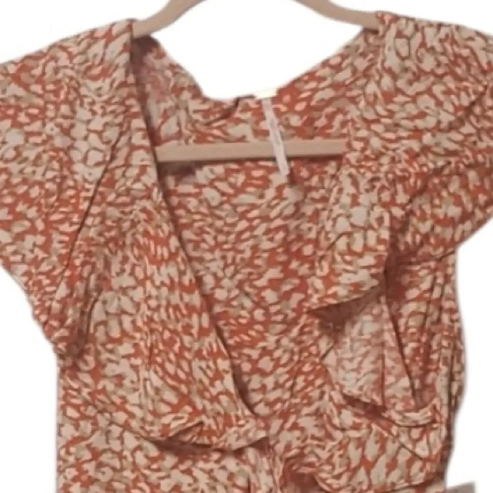 Free People French Quarter Wrap Mini Dress orange and white animal small